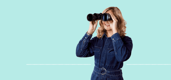 Gender Diversity at TOPdesk - a woman looking through binoculars