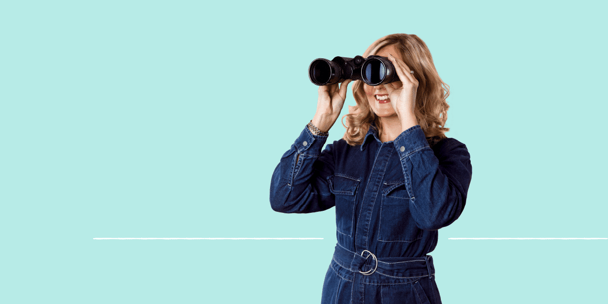 Gender Diversity at TOPdesk - a woman looking through binoculars