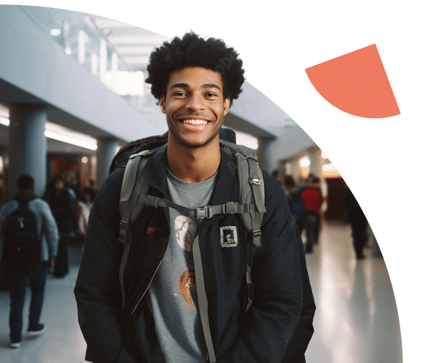 Smiling student at school with a backpack
