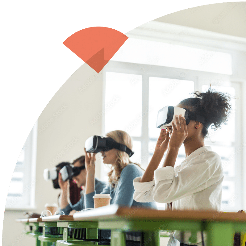 Students in classroom looking through VR glasses